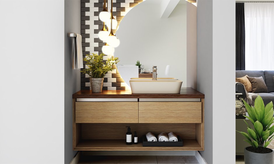 Cream coloured wash basin with storage stands out and looks modern.