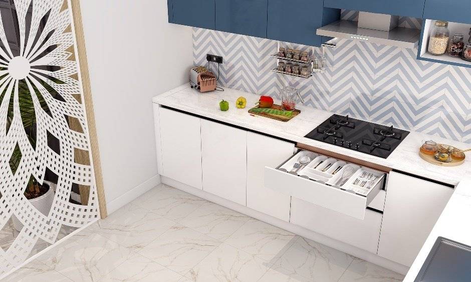 Kitchen pull-out baskets with a cutlery tray for better organisation of the space