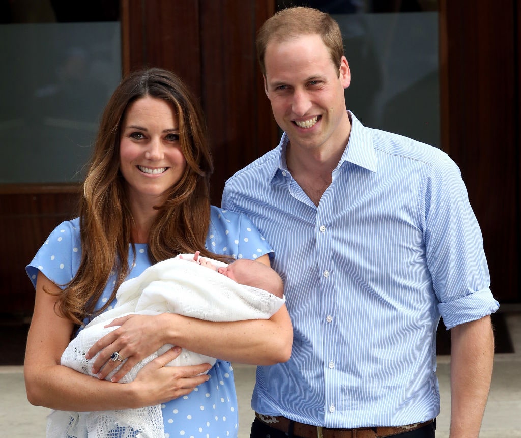 Kate Middleton and Prince William leave the Lindo Wing with their newborn Prince George.