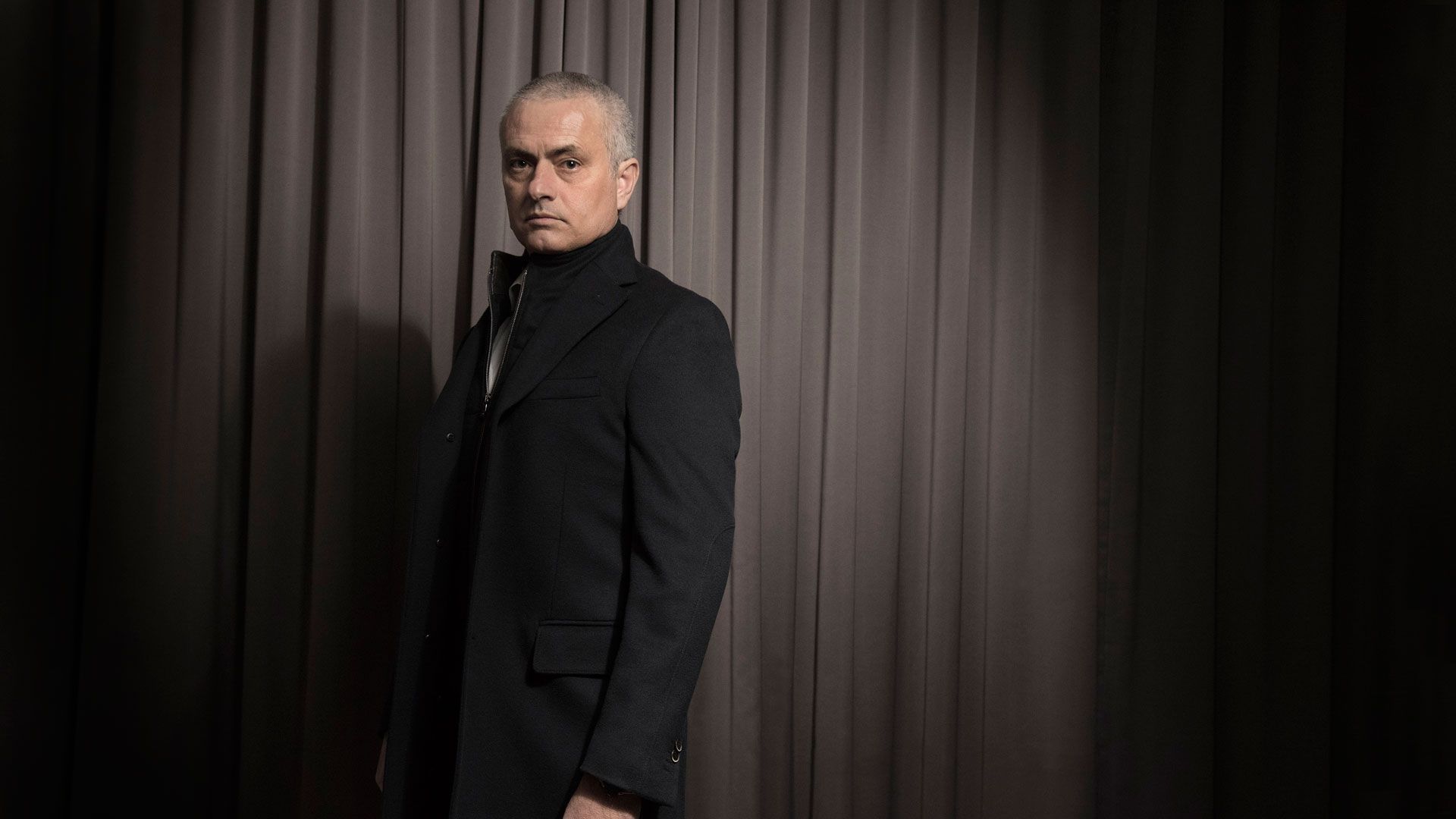 Image may contain Clothing Apparel Overcoat Coat Jos Mourinho Suit Human and Person