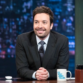 Image may contain Jimmy Fallon Human Person Tie Accessories Accessory Suit Coat Clothing Overcoat and Apparel