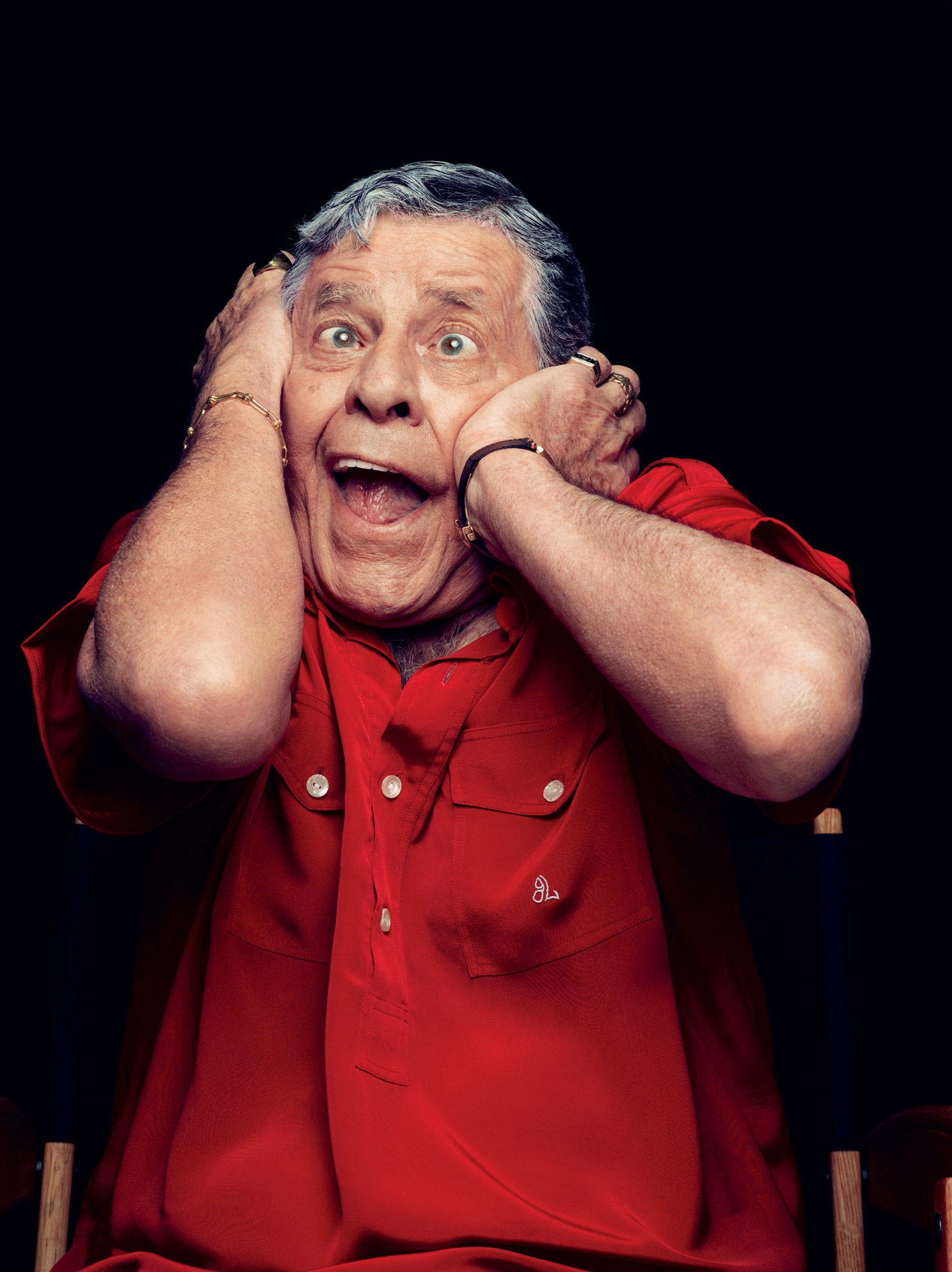 Image may contain Human Person Clothing Apparel Jerry Lewis and Finger