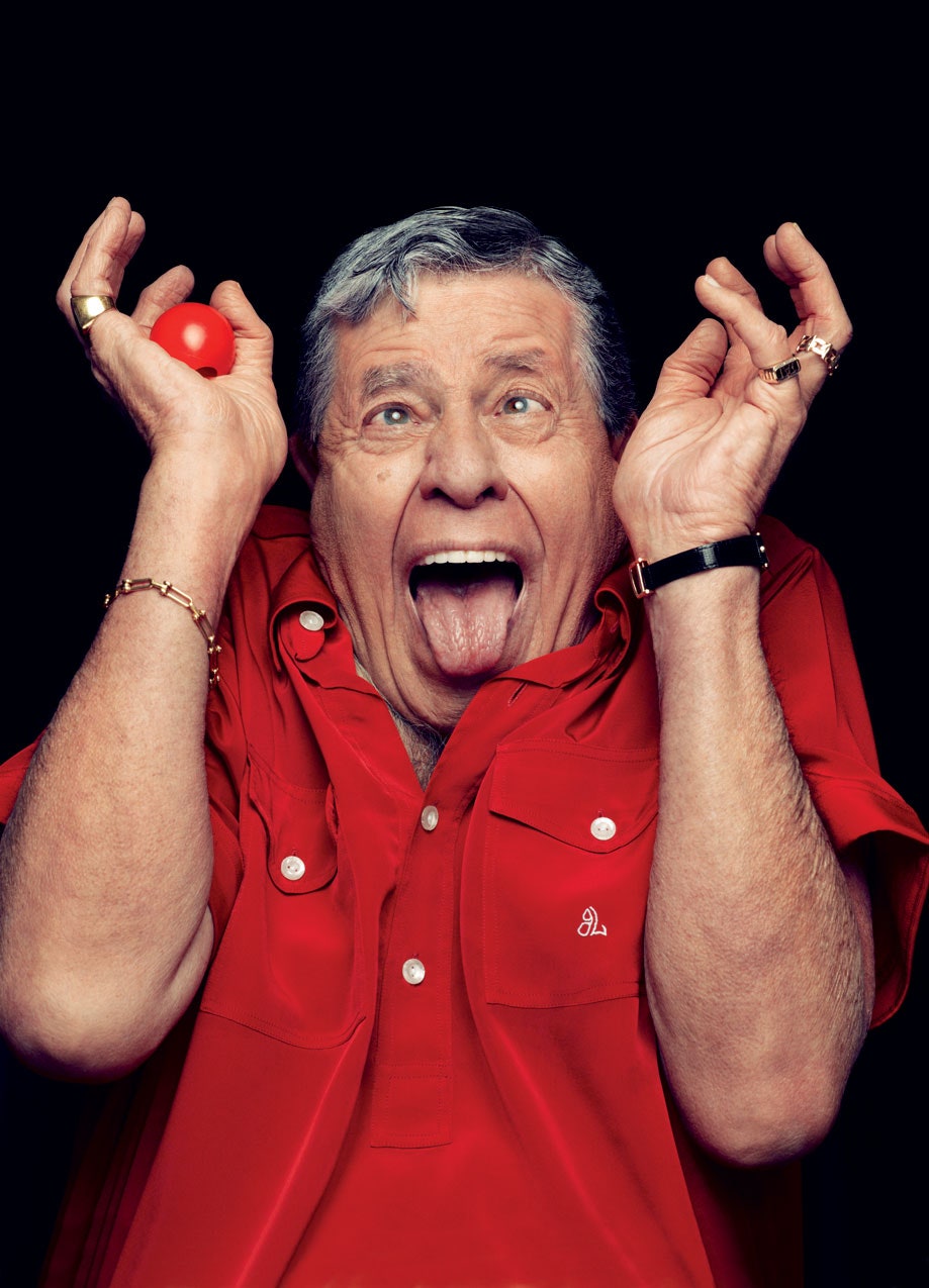 Image may contain Jerry Lewis Human Person Finger Clothing Apparel Face and Hand