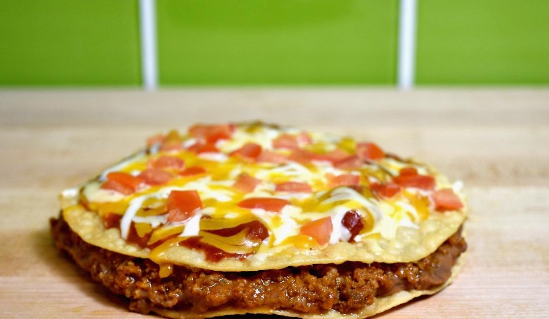 A close-up of Taco Bell's Mexican Pizza 