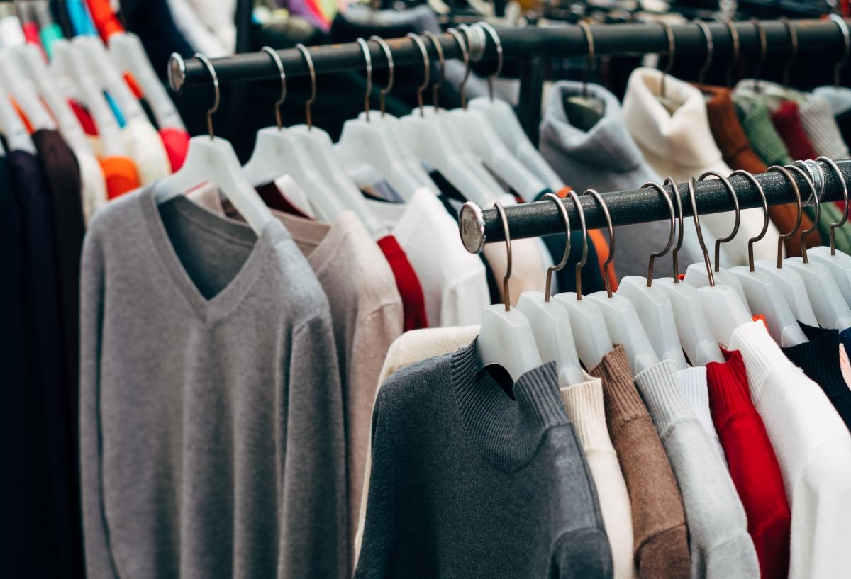 sweaters on clothing racks