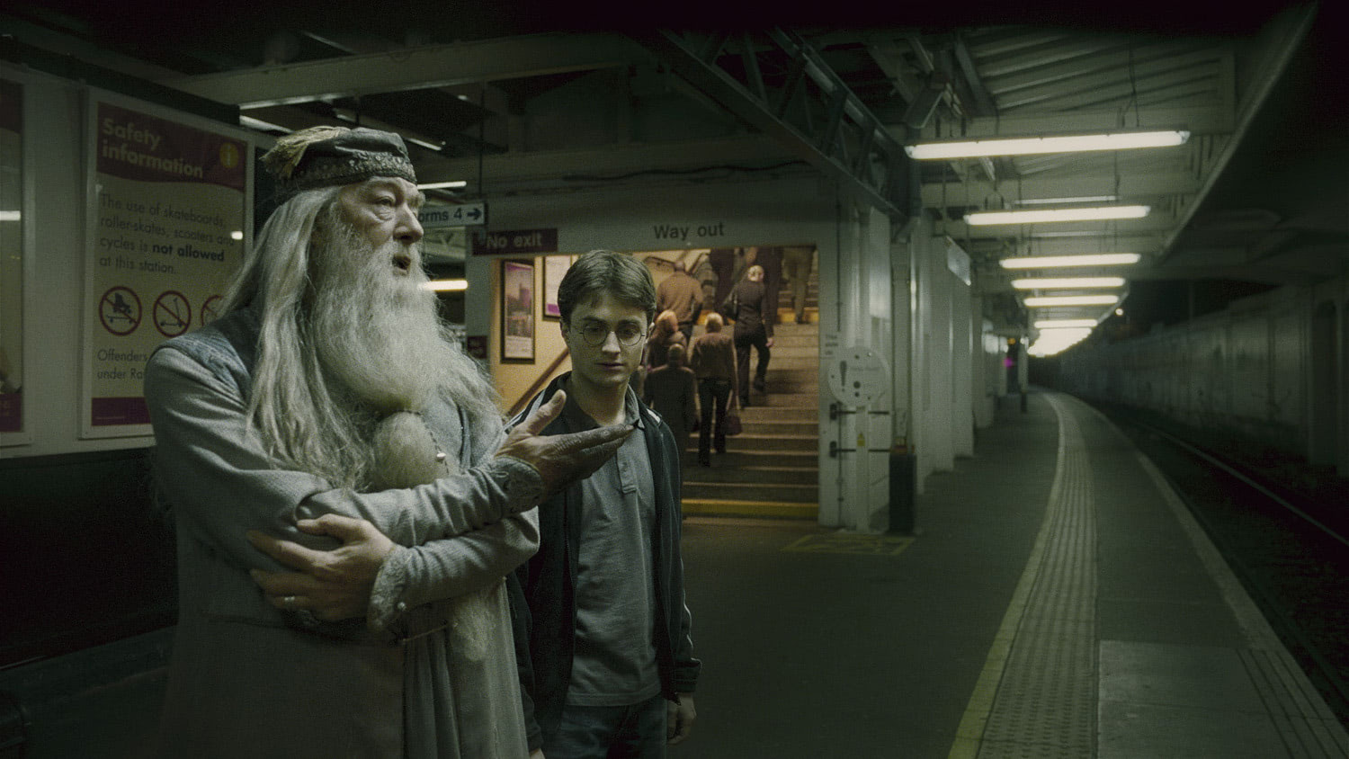 Dumbledore and Harry at the train station