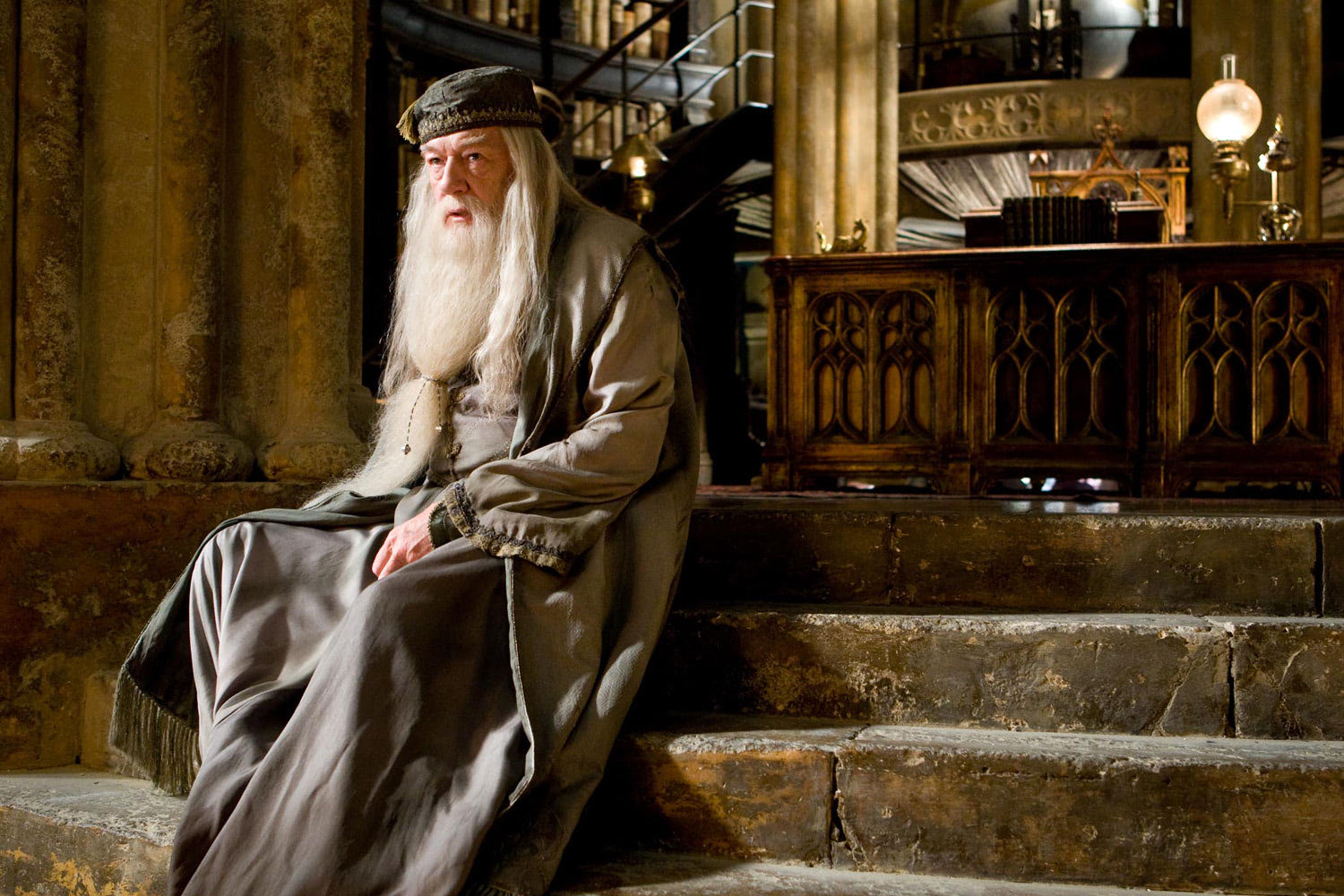 Dumbledore sits on the steps