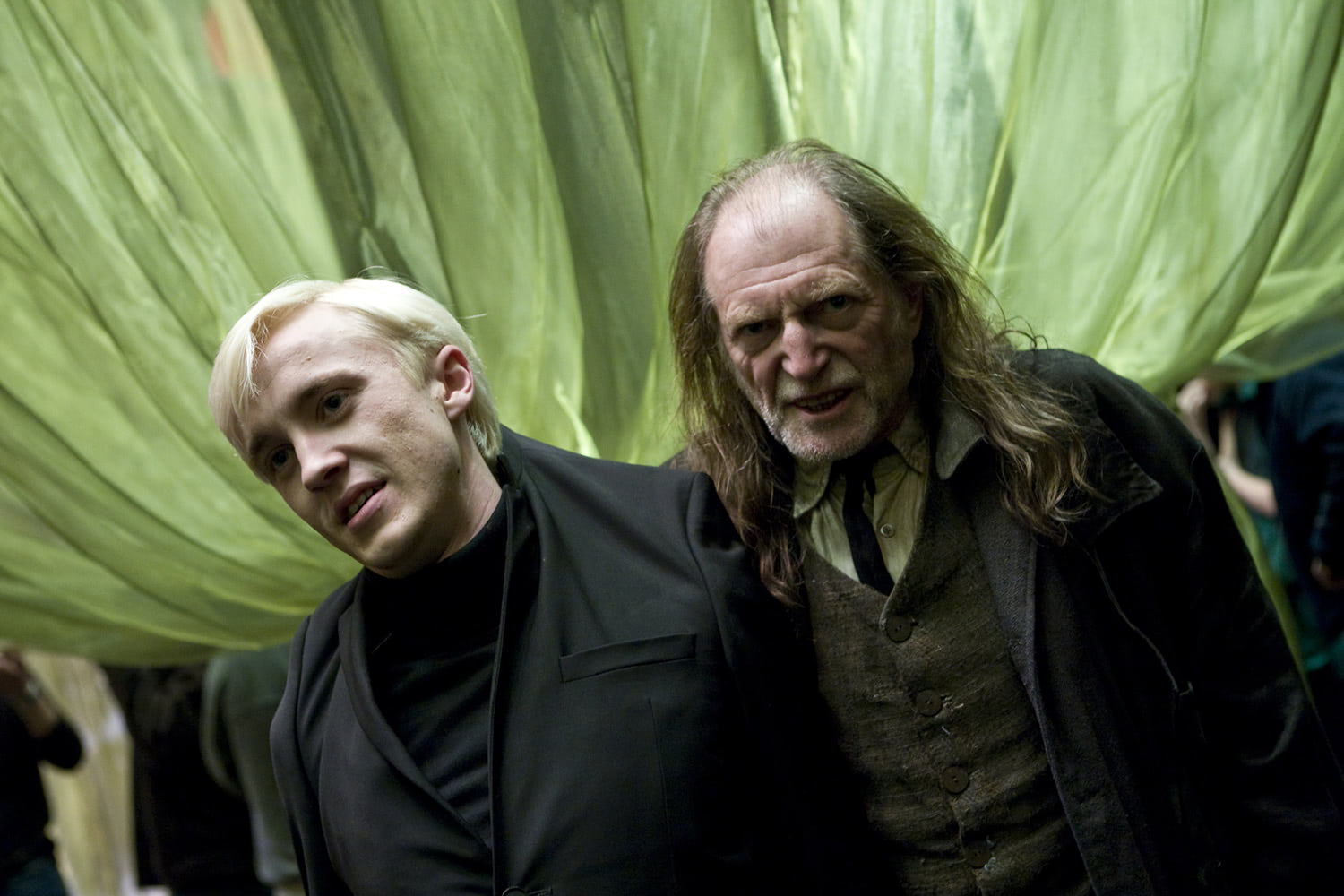 Filch catches Draco at Slughorn’s party