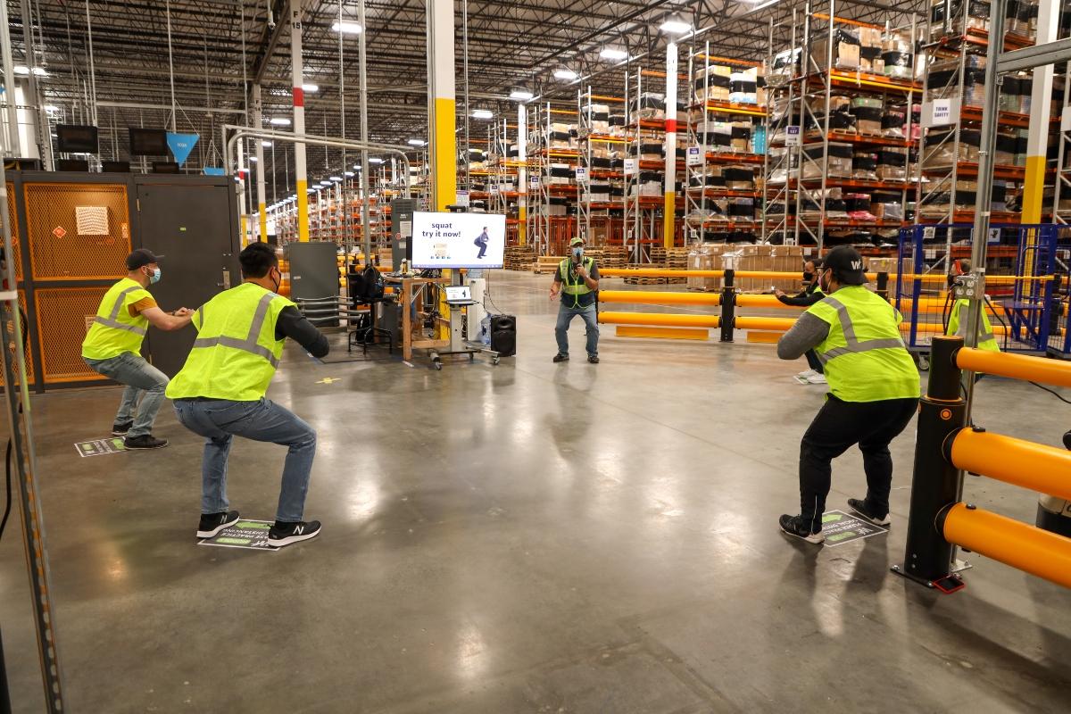 Amazon workers participating in a safety course