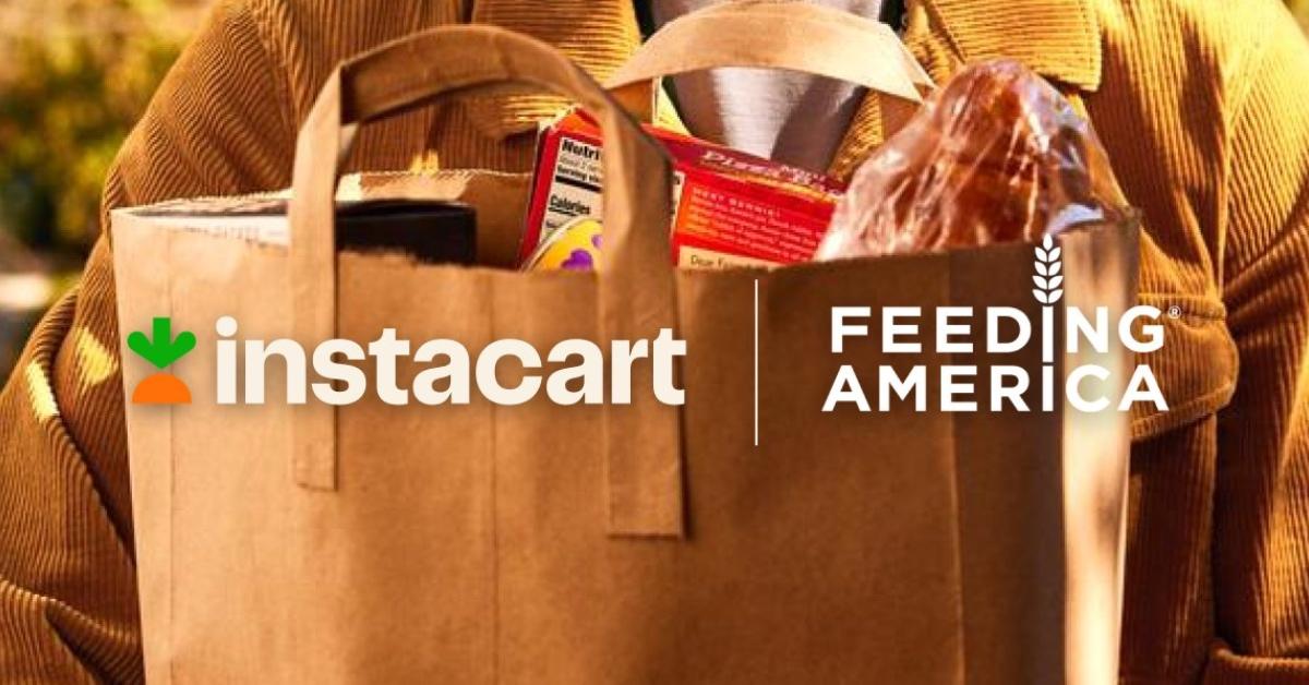 Instacart shopper holding groceries