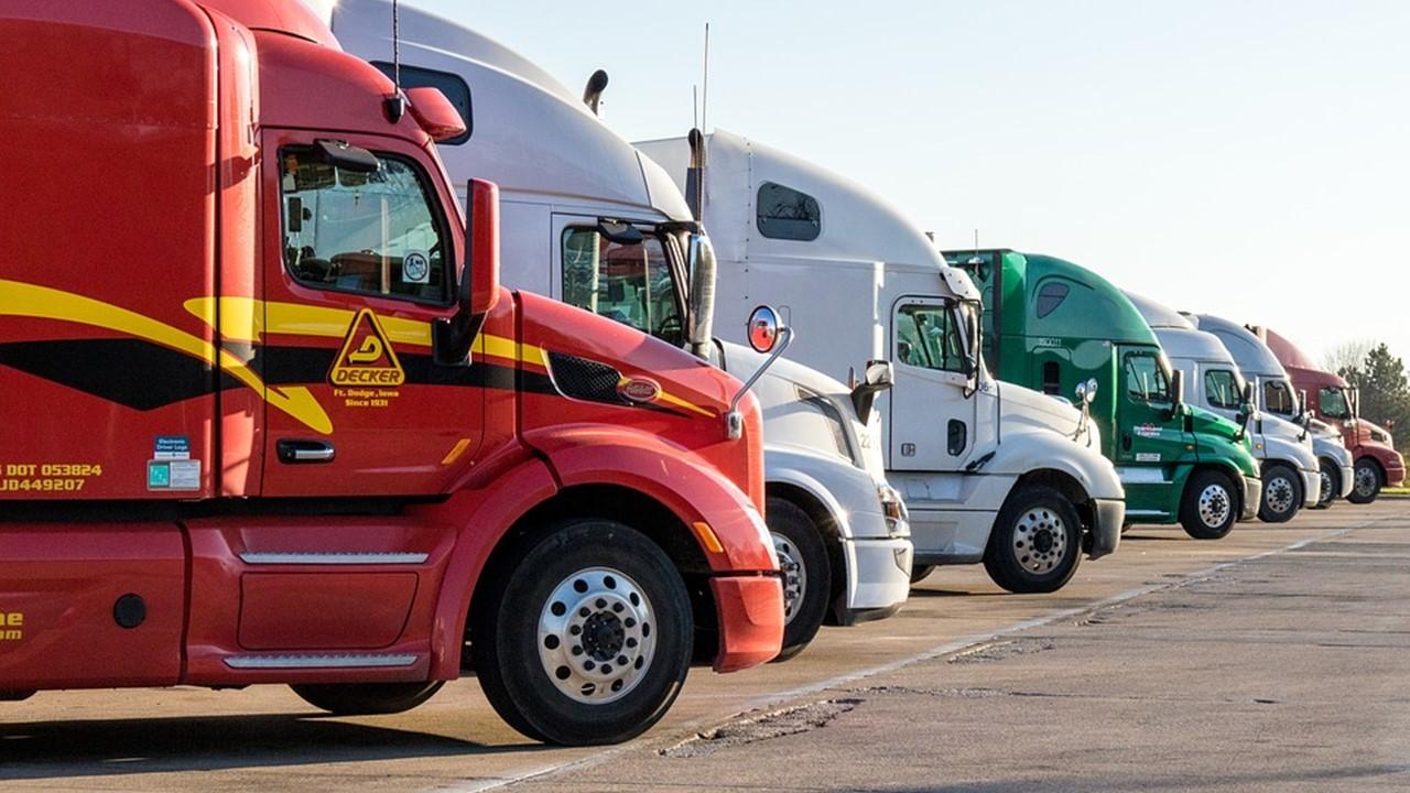 Semi trucks in a parking lot