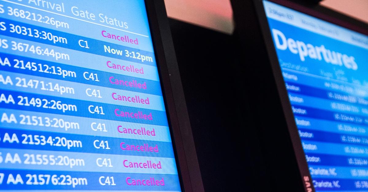 Airport screen displayed several canceled flights