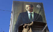 Why did former Syrian President Bashar Assad give up power?