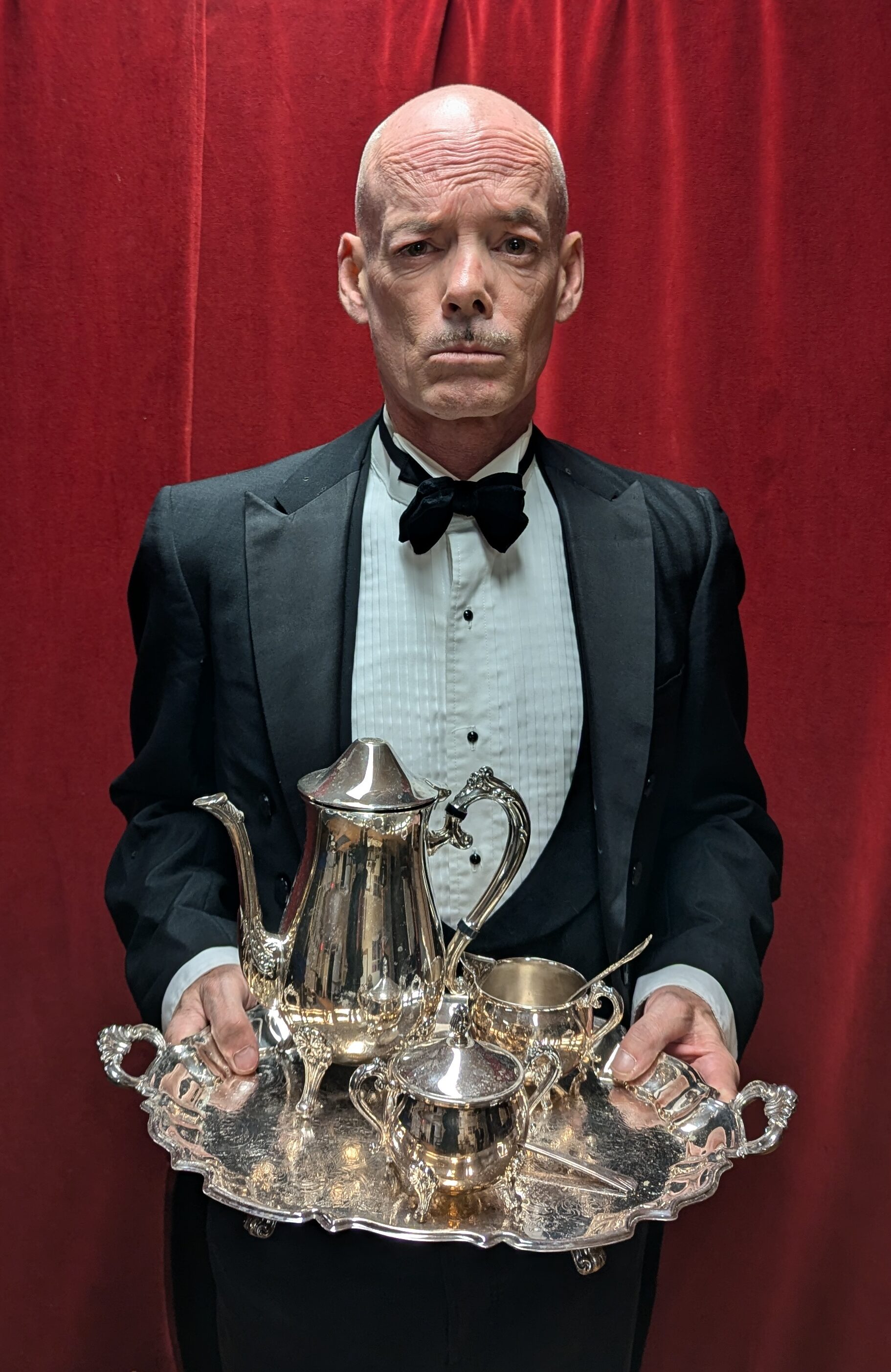 <p>Pat Larkin as Wadsworth the butler in PECT&#8217;s production of Clue: Onstage (Photo: Chris Fanning)</p>
