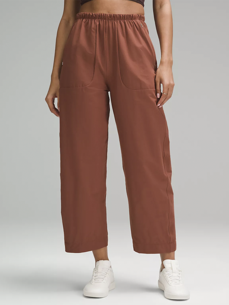 Lightweight Mid-Rise Barrel-Leg Cropped Pant in muted copper color way on model