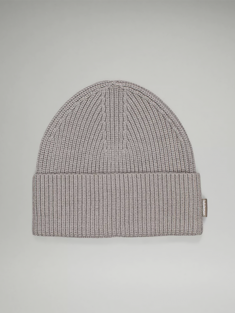 Ribbed Merino Wool-Blend Knit Beanie in dark gray color way on dark background