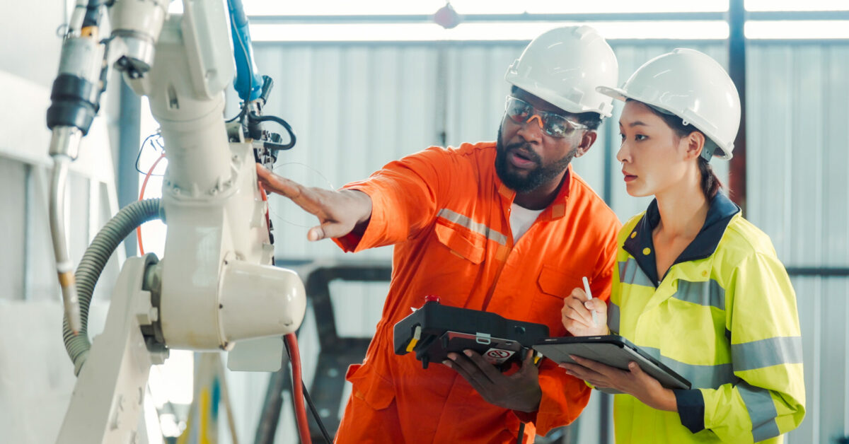 Manufacturing employees working on manufacturing efficiency