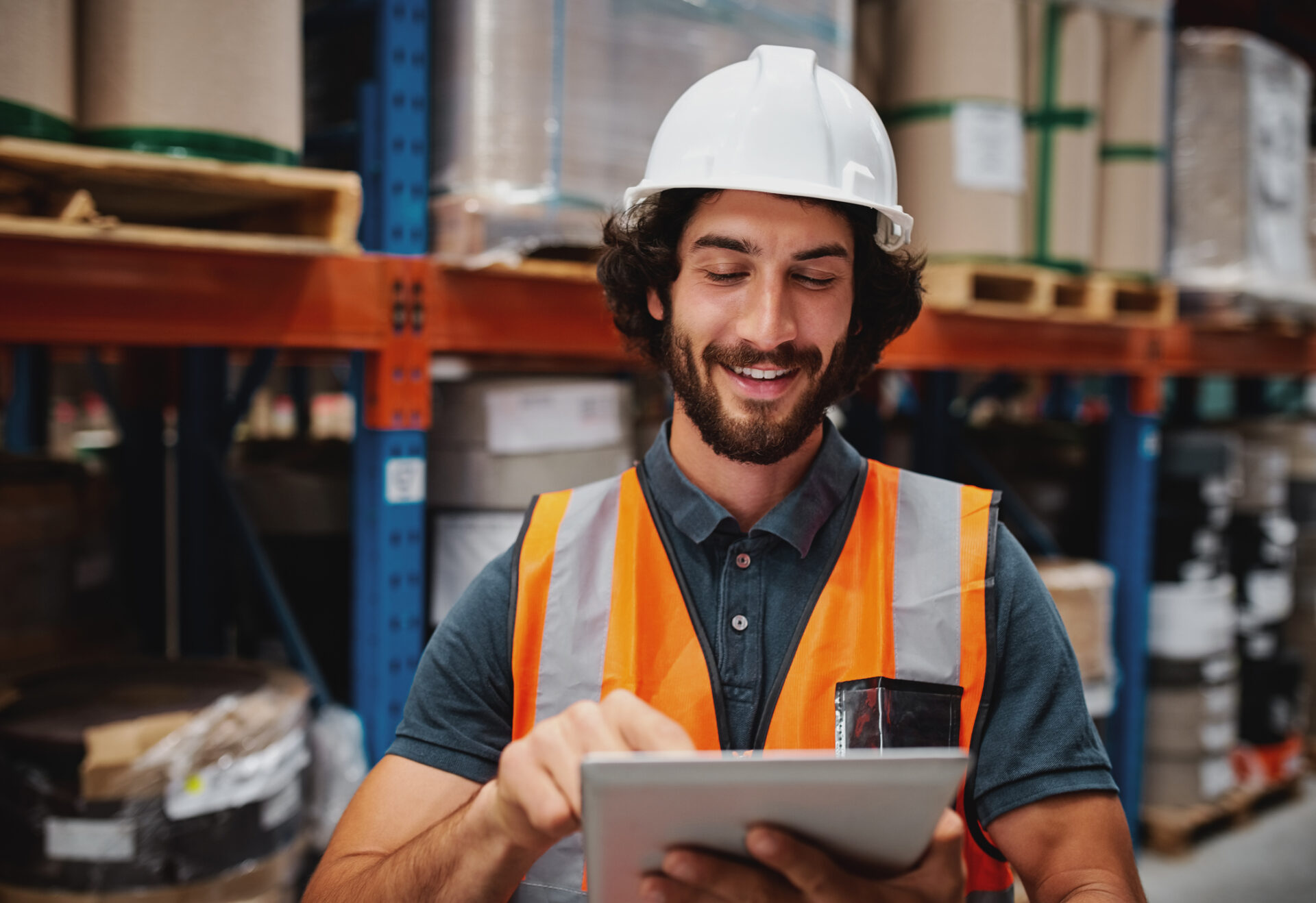 Employee in warehouse on a tablet