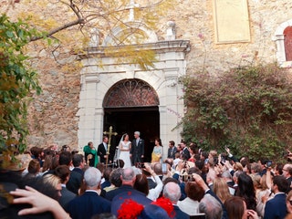 The couple are met by wellwishers after leaving the church