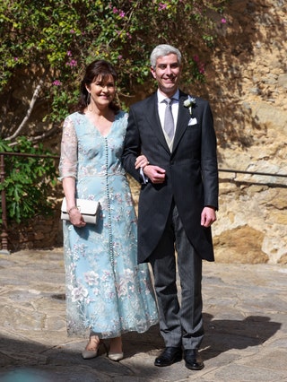 Nicolas Bagory and his mother arrive at church