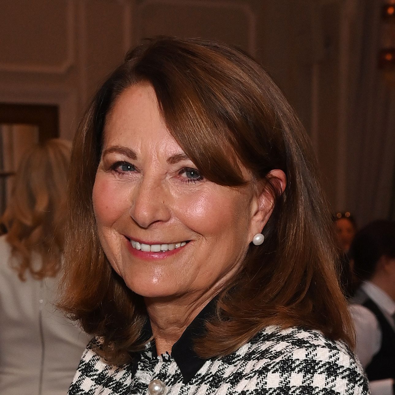 Carole Middleton carries a poignant handbag with a subtle nod to the Princess of Wales as she attends a cancer charity lunch