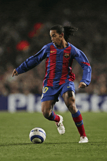 a soccer player with the number 10 on his jersey is running with the ball