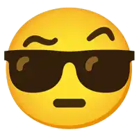 a yellow smiley face with sunglasses on it 's face