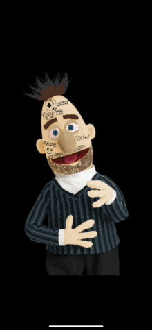 a puppet with a beard has a tattoo on his face that says " god "