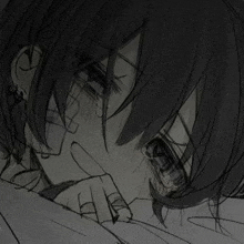 a black and white drawing of a person crying with tears coming out of their eyes .