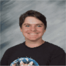 a man wearing a black shirt with a picture of earth on it