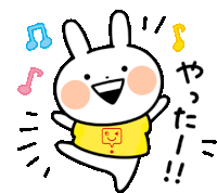 a cartoon rabbit wearing a yellow shirt with a smiley face on the chest