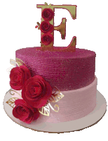 a pink cake with the letter e on top of it