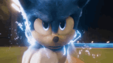 a close up of sonic the hedgehog 's face with lightning coming out of it