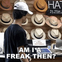 a man wearing a hat stands in front of a wall of hats and a sign that says " no cash refunds "