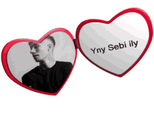 a heart shaped mirror with a picture of a man and the words yny sebi ily on it