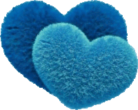 two blue heart shaped pillows are sitting on top of each other on a white background