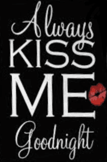 a poster that says `` always kiss me goodnight '' with a kiss on it .