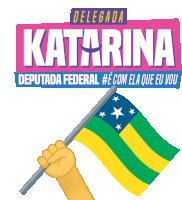 a hand holding a flag under a sign that says delegata katarina