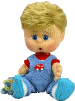 a knitted doll with blue overalls and a red shirt with a mushroom on it