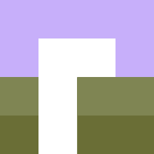 a white square is sitting on top of a purple and green block .