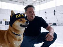 a man is kneeling next to a dog wearing a hat that says dea