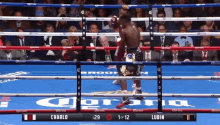 a boxing match between charlo and lubin is being shown on a screen