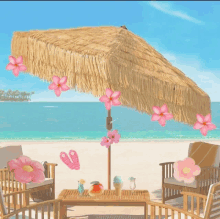 a thatched umbrella on a beach with pink flowers