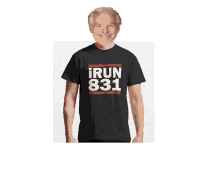 a man wearing a t-shirt that says iron 831