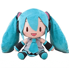 hatsune miku plush toy with headphones and a tie