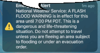 a message from the national weather service warning of a flash flood