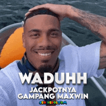 a man on a boat with the words waduhh jackpotnya gampang maxwin on the bottom