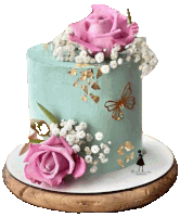 a cake with pink roses and baby 's breath and a butterfly on it