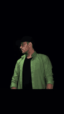 a man in a green shirt and black hat