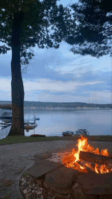 a fire pit in the middle of a lake